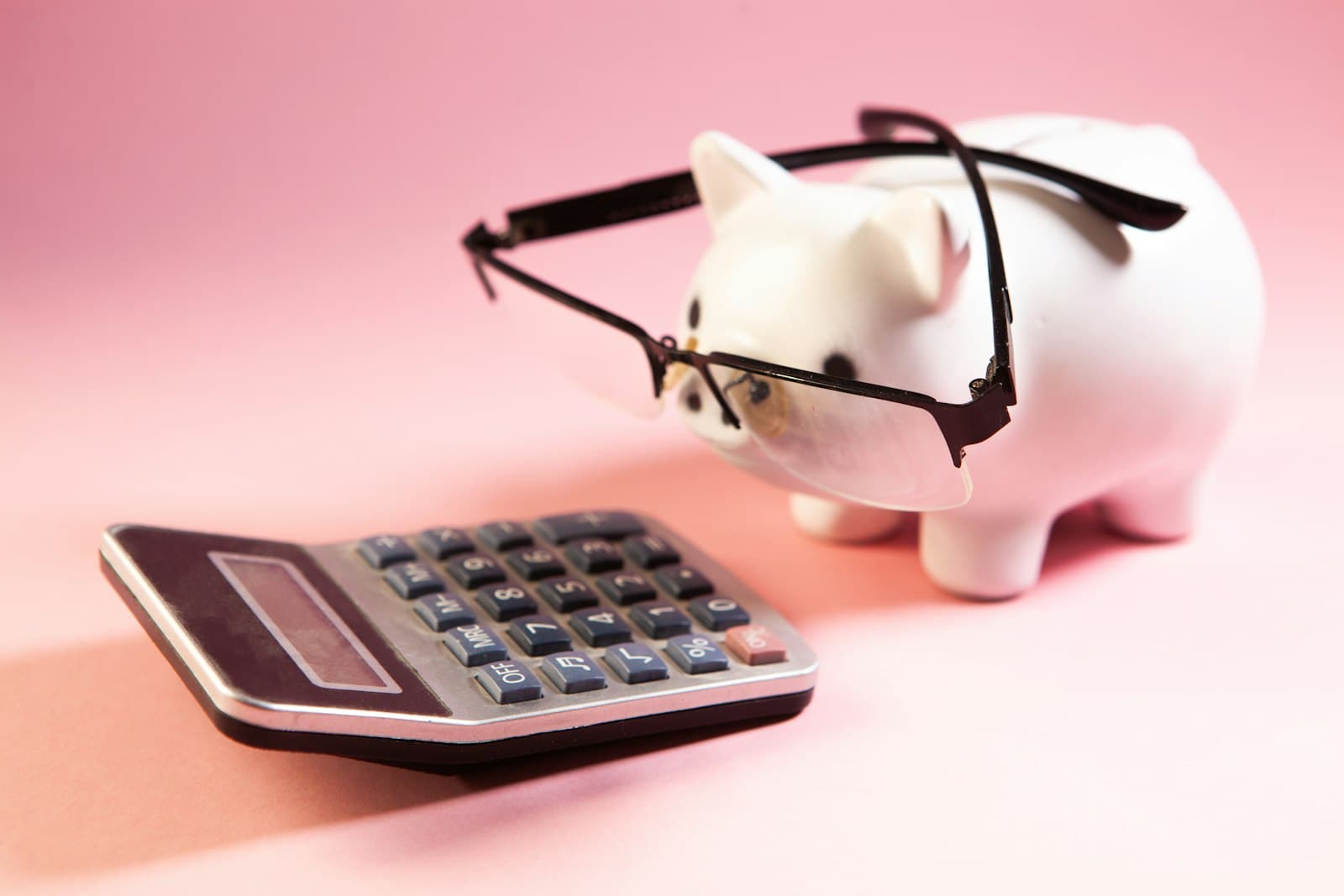 Calculator and pension statement showing tax relief